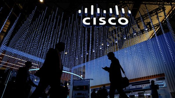 People pass by Cisco stand at the GSMA's 2022 Mobile World Congress (MWC) in Barcelona, Spain March 1, 2022 - Sputnik International