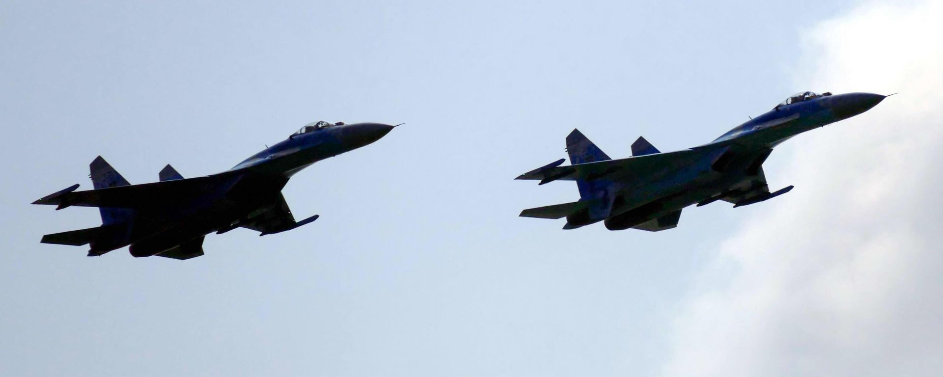 Ukrainian Su-27 (NATO reporting name: Flanker-B) fighter jets Ukrainian Su-27 (NATO reporting name: Flanker-B) fighter jets - Sputnik International, 1920, 07.05.2022