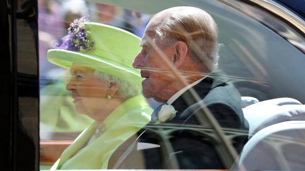 Britain's Queen Elizabeth II and Britain's Prince Philip, Duke of Edinburgh leave after attending the wedding ceremony of Britain's Prince Harry, Duke of Sussex and US actress Meghan Markle at St George's Chapel, Windsor Castle, in Windsor, on May 19, 2018. - Sputnik International