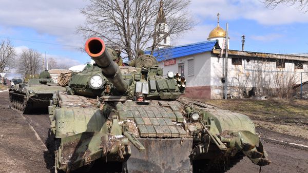 DPR People's Militia in a tank ride along the street of the village of Bugas.
 - Sputnik International