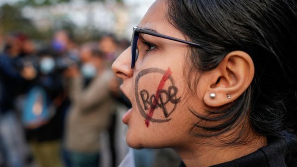 A university student shouts slogan during a protest rally against recent gang rape of a girl in New Delhi, in Kolkata, India, Saturday, Jan. 29, 2022 - Sputnik International