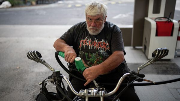 Jacques Petite fills his motorcycle with petrol at a gas station in Marseille, southern France, Thursday, Oct. 21, 2021 - Sputnik International