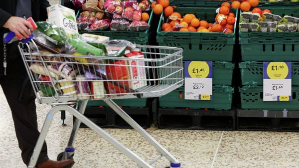 Clubcard branding is seen inside a branch of a Tesco Extra supermarket in London - Sputnik International