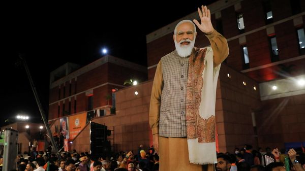 A cut out of India's Prime Minister Narendra Modi is seen as he addresses the crowd after his party won the state assembly elections in the Uttar Pradesh state - Sputnik International