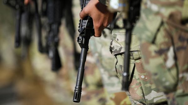 U.S. troops in transfer to military base in Grafenwoehr to strengten NATO efforts in Eastern Europe as Russian military operation in Ukraine continues, carrying rifles stand in formation at the Albrecht Duerer Airport in Nuremberg, Germany March 1, 2022 U.S. troops in transfer to military base in Grafenwoehr to strengten NATO efforts in Eastern Europe as Russian military operation in Ukraine continues, carrying rifles stand in formation at the Albrecht Duerer Airport in Nuremberg, Germany March 1, 2022 - Sputnik International