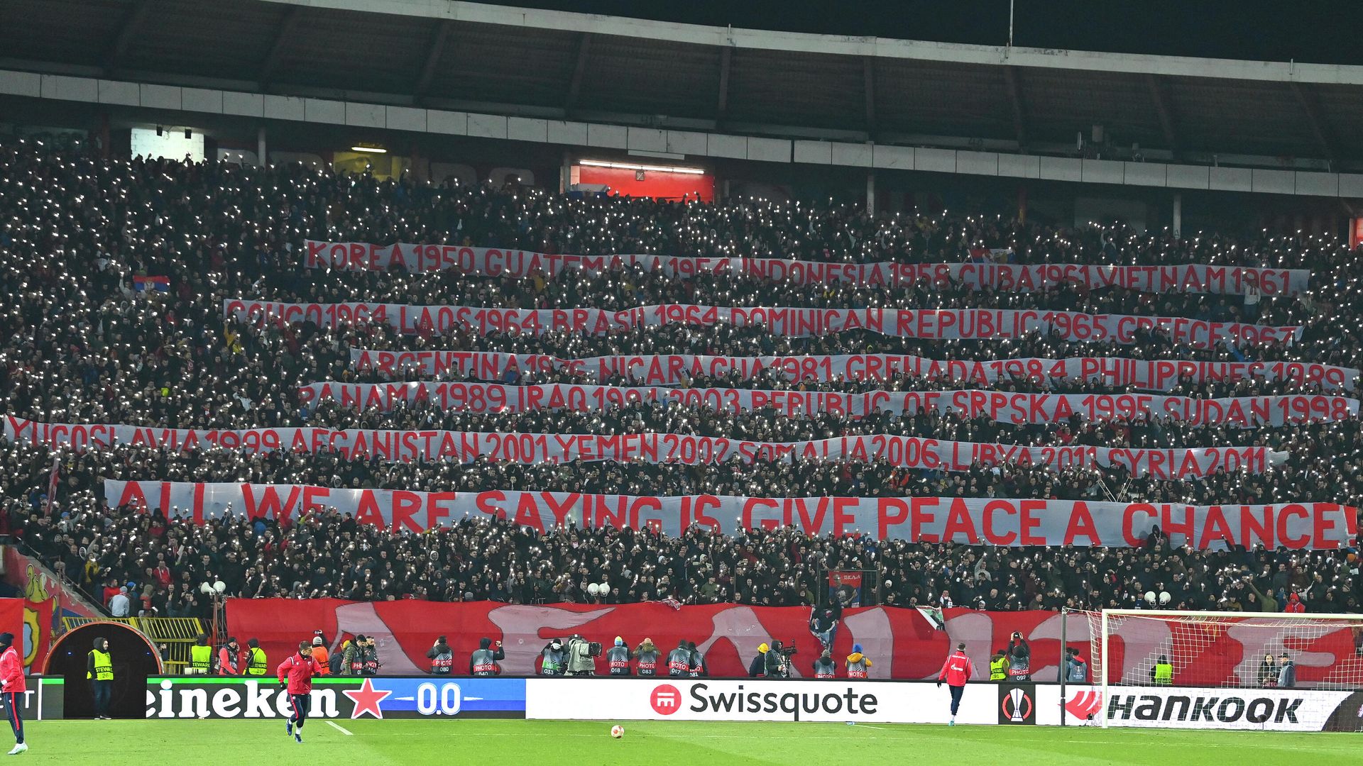 Red Star supporters display banners regarding peace during the UEFA Europa League Round of 16, second leg football match between Red Star Belgrade (Crvena Zvezda) and Glasgow Rangers at the Rajko Mitic Stadium, in Belgrade, on March 17, 2022. Red Star supporters display banners regarding peace during the UEFA Europa League Round of 16, second leg football match between Red Star Belgrade (Crvena Zvezda) and Glasgow Rangers at the Rajko Mitic Stadium, in Belgrade, on March 17, 2022. - Sputnik International, 1920, 18.03.2022
