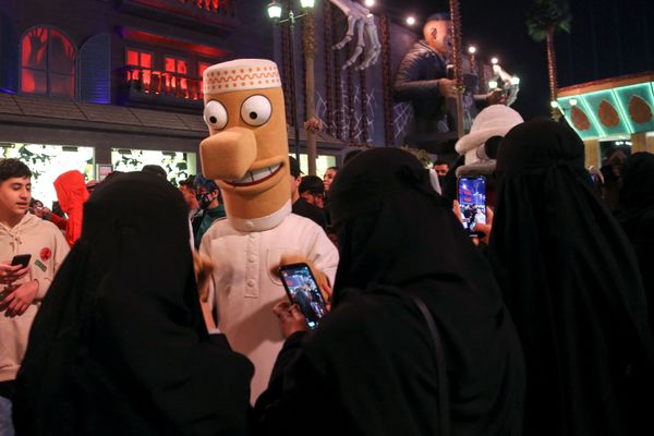 A person dressed in a costume walks on a street as people take part in a two-day costume event in Riyadh, Saudi Arabia, 17 March 2022. - Sputnik International