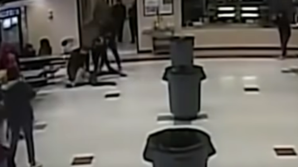 A screenshot from video of the March 4 Kenosha school fight - Sputnik International