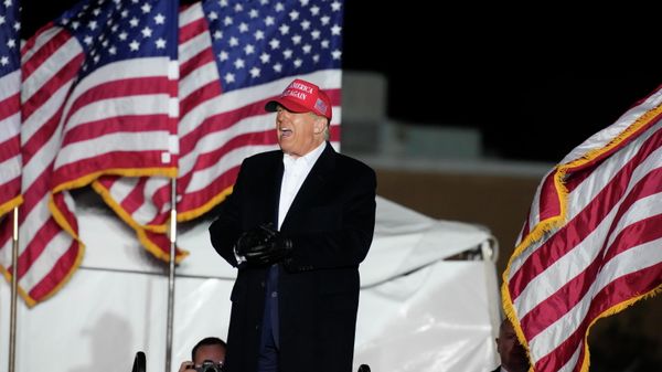 Former President Donald Trump arrives at a rally on Saturday, March 12, 2022, in Florence, S.C. Trump has endorsed two Republicans mounting primary challenges to sitting House members who have been critical of him.  - Sputnik International