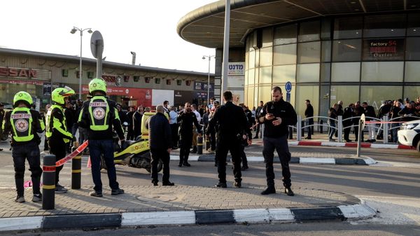 Israeli security and rescue forces secure the scene of an attack in which people were killed near a shopping centre in Beersheba, Israel, March 22, 2022 - Sputnik International