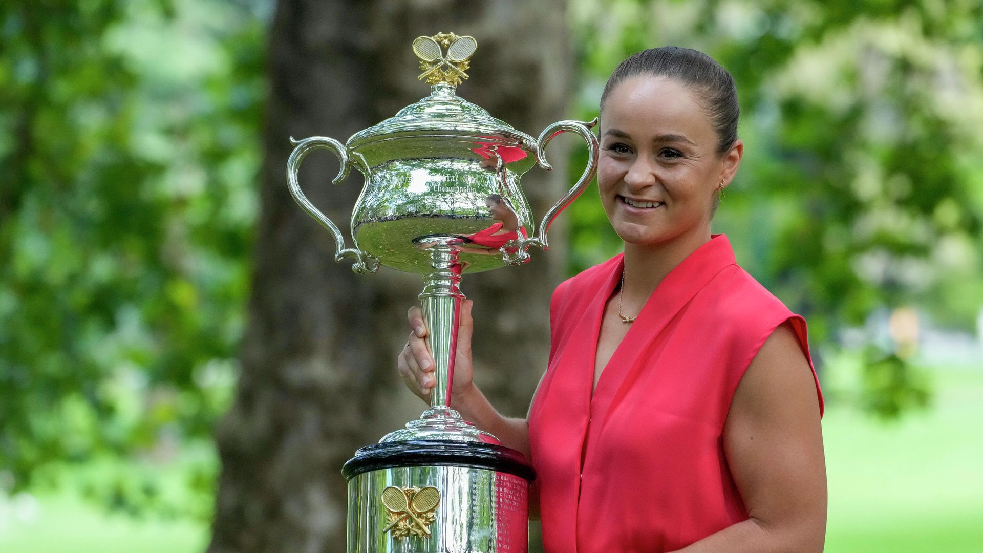 FILE - Ash Barty of Australia poses with the Daphne Akhurst Memorial Cup at a park, the morning after defeating Danielle Collins of the U.S. in the women's singles final at the Australian Open tennis championships in Melbourne on Jan. 30, 2022. In a shock announcement Wednesday, March 23, 2022, No. 1-ranked Barty announced her retirement from tennis FILE - Ash Barty of Australia poses with the Daphne Akhurst Memorial Cup at a park, the morning after defeating Danielle Collins of the U.S. in the women's singles final at the Australian Open tennis championships in Melbourne on Jan. 30, 2022. In a shock announcement Wednesday, March 23, 2022, No. 1-ranked Barty announced her retirement from tennis - Sputnik International, 1920, 23.03.2022