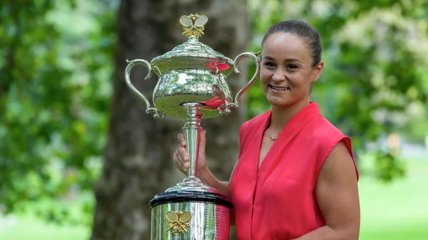 FILE - Ash Barty of Australia poses with the Daphne Akhurst Memorial Cup at a park, the morning after defeating Danielle Collins of the U.S. in the women's singles final at the Australian Open tennis championships in Melbourne on Jan. 30, 2022. In a shock announcement Wednesday, March 23, 2022, No. 1-ranked Barty announced her retirement from tennis FILE - Ash Barty of Australia poses with the Daphne Akhurst Memorial Cup at a park, the morning after defeating Danielle Collins of the U.S. in the women's singles final at the Australian Open tennis championships in Melbourne on Jan. 30, 2022. In a shock announcement Wednesday, March 23, 2022, No. 1-ranked Barty announced her retirement from tennis - Sputnik International