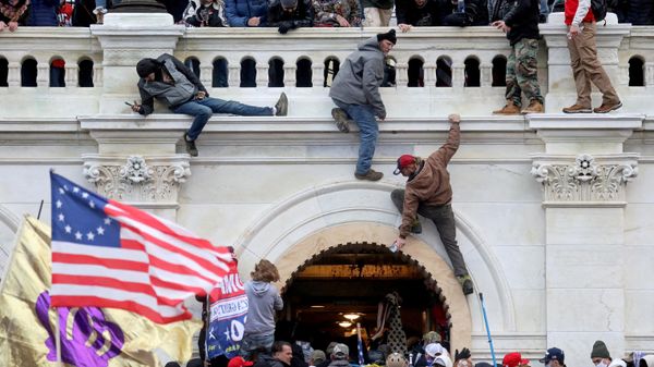 A mob of supporters of U.S. President Donald Trump fight with members of law enforcement at a door they broke open as they storm the U.S. Capitol Building in Washington, U.S., January 6, 2021. - Sputnik International