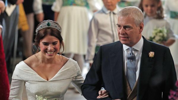 Britain's Princess Eugenie of York (L) accompanied by her father Britain's Prince Andrew, Duke of York, (R) walk up the aisle during her wedding ceremony to Jack Brooksbank at St George's Chapel, Windsor Castle, in Windsor, on October 12, 2018. - Sputnik International