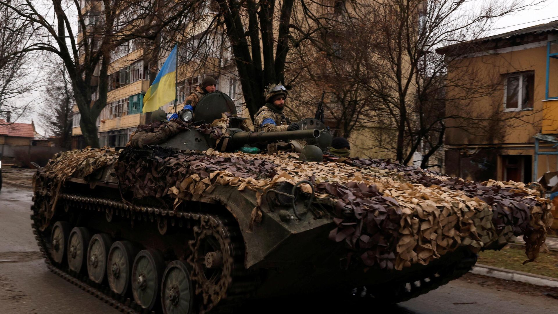 Ukrainian soldiers are pictured on their military vehicle, amid Russia's invasion on Ukraine in Bucha, in Kyiv region, Ukraine April 2, 2022. REUTERS/Zohra Bensemra - Sputnik International, 1920, 04.04.2022