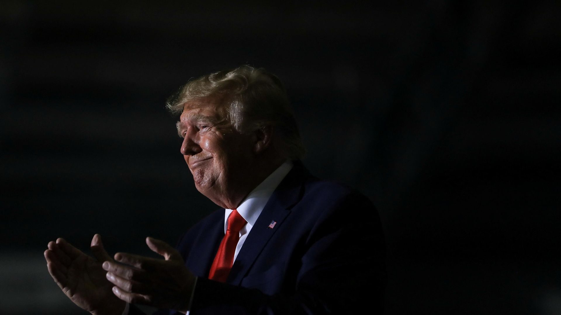 Former U.S. President Donald Trump claps as Michigan Secretary of State candidate Kristina Karamo speaks during a rally in Washington Township, Michigan, U.S. April 2, 2022. - Sputnik International, 1920, 04.04.2022