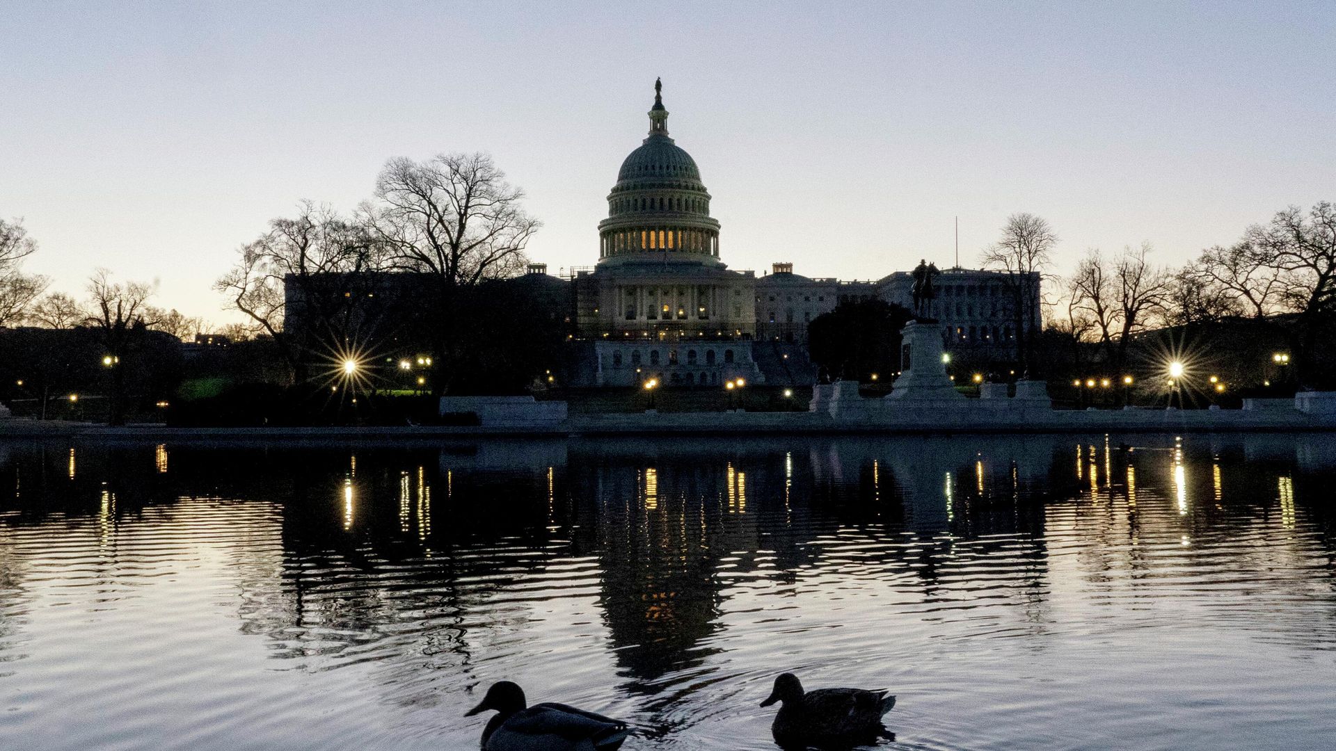 The U.S. Capitol building is seen before sunrise on Capitol Hill in Washington, Monday, March. 21, 2022. - Sputnik International, 1920, 04.04.2022