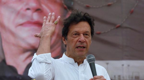 FILE PHOTO: Imran Khan, chairman of the Pakistan Tehreek-e-Insaf (PTI), gestures while addressing his supporters during a campaign meeting ahead of general elections in Karachi, Pakistan, July 4, 2018. FILE PHOTO: Imran Khan, chairman of the Pakistan Tehreek-e-Insaf (PTI), gestures while addressing his supporters during a campaign meeting ahead of general elections in Karachi, Pakistan, July 4, 2018. - Sputnik International
