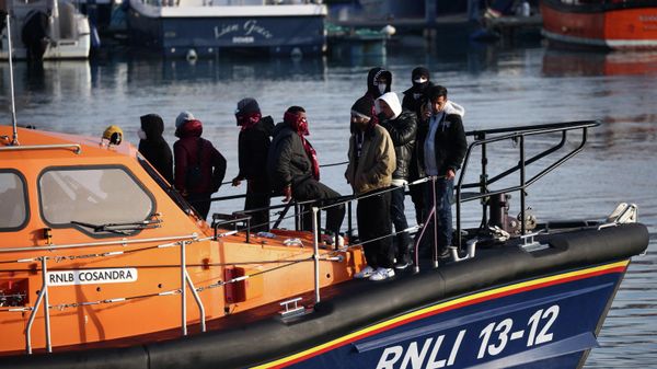 Migrants are brought into the Port of Dover after being rescued while crossing the English Channel, in Dover - Sputnik International