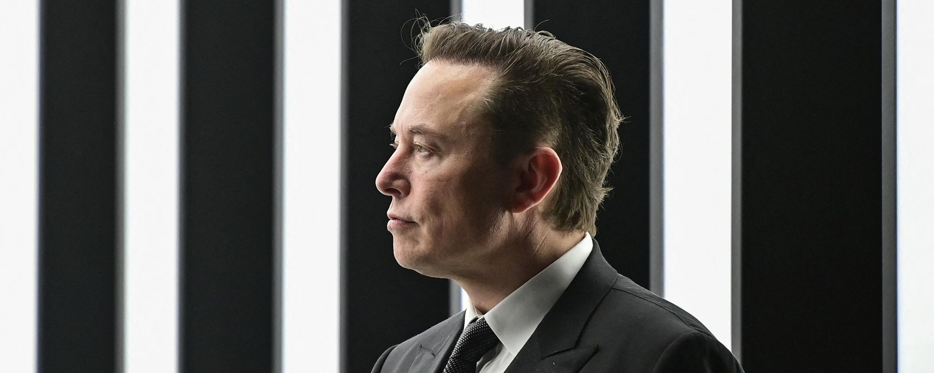 (FILES) In this file photo taken on March 22, 2022, Tesla CEO Elon Musk is pictured as he attends the start of the production at Tesla's Gigafactory in Gruenheide, southeast of Berlin (FILES) In this file photo taken on March 22, 2022, Tesla CEO Elon Musk is pictured as he attends the start of the production at Tesla's Gigafactory in Gruenheide, southeast of Berlin - Sputnik International, 1920, 27.04.2022