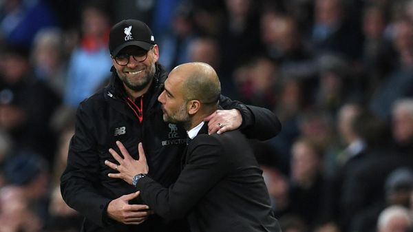 Liverpool's German manager Jurgen Klopp (L) greets Manchester City's Spanish manager Pep Guardiola after the English Premier League football match between Manchester City and Liverpool at the Etihad Stadium in Manchester, north west England, on March 19, 2017. Liverpool's German manager Jurgen Klopp (L) greets Manchester City's Spanish manager Pep Guardiola after the English Premier League football match between Manchester City and Liverpool at the Etihad Stadium in Manchester, north west England, on March 19, 2017. - Sputnik International