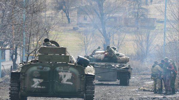 Military hardware is pictured in Bugas, Donetsk People's Republic. Tension began to escalate in Donbass on 17 February, with the Donetsk People's Republic and the Lugansk People's Republic reporting the most intense shellfire in months. Early on 24 February, Russia's President Putin announced his decision to launch a special military operation in response to requests from the leaders of the Donetsk People's Republic and the Lugansk People's Republic. - Sputnik International