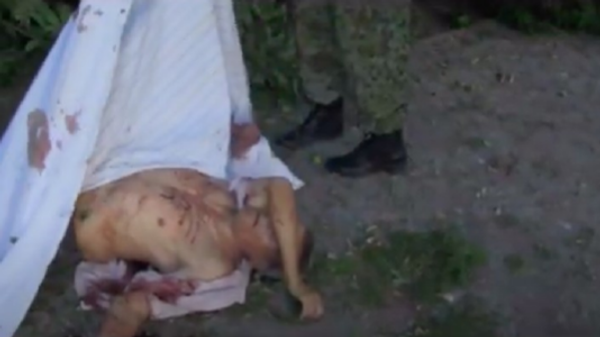 This grandfather is one of many helpless elderly people who died in the shelling of a nursing home in Lugansk on 28 July 2014. - Sputnik International