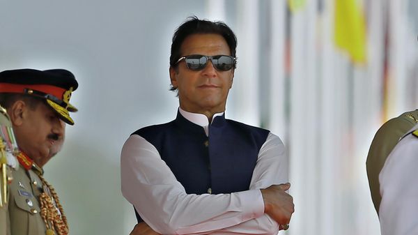 Pakistan's Prime Minister Imran Khan attends a military parade to mark Pakistan National Day, in Islamabad, Pakistan, Wednesday, March 23, 2022. - Sputnik International