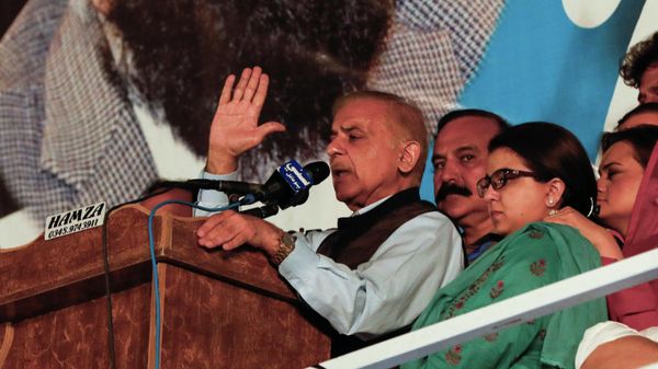 Leader of the opposition party Mian Muhammad Shehbaz Sharif, brother of ex-prime minister Nawaz Sharif, speaks to supporters during an anti-government rally organized by the Pakistan Democratic Movement (PDM), an alliance of political opposition parties, after the parliament took up a no-confidence motion moved by opposition lawmakers in a bid to remove Prime Minister Imran Khan, in Islamabad, Pakistan March 29, 2022.  - Sputnik International