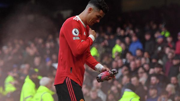 Manchester United's Portuguese striker Cristiano Ronaldo reacts to their defeat as he leaves after the English Premier League football match between Everton and Manchester United at Goodison Park in Liverpool, north west England on April 9, 2022. - Sputnik International