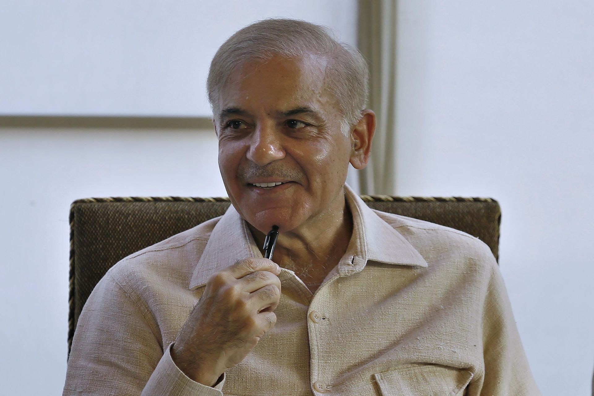 Pakistan's opposition leader Shahbaz Sharif smiles during a press conference, in Islamabad, Pakistan, Wednesday, March 30, 2022. Lawmakers appeared poised to push Prime Minister Imran Khan out of power in an upcoming no-confidence vote, after a small but key coalition partner abandoned him and joined the opposition. (AP Photo/Anjum Naveed) - Sputnik International, 1920, 24.04.2022