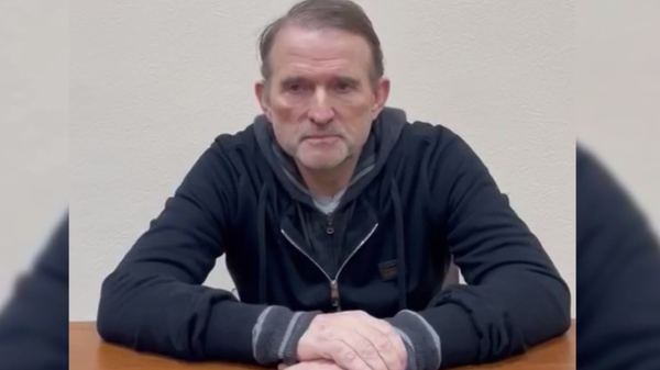 Screengrab from Ukrainian Security Services video of detained Ukrainian opposition figure Viktor Medvedchuk reading a prepared text asking to be exchanged for Ukrainian troops and civilians in Mariupol. Screengrab from Ukrainian Security Services video of detained Ukrainian opposition figure Viktor Medvedchuk reading a prepared text asking to be exchanged for Ukrainian troops and civilians in Mariupol. - Sputnik International