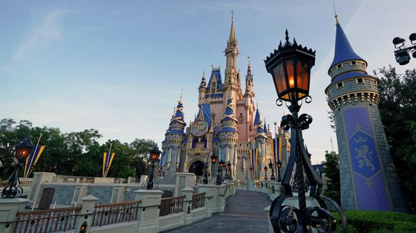 The newly painted Cinderella Castle at the Magic Kingdom at Walt Disney World is seen with the the crest to celebrate the 50th anniversary of the theme park Monday, Aug. 30, 2021, in Lake Buena Vista, Fla The newly painted Cinderella Castle at the Magic Kingdom at Walt Disney World is seen with the the crest to celebrate the 50th anniversary of the theme park Monday, Aug. 30, 2021, in Lake Buena Vista, Fla - Sputnik International