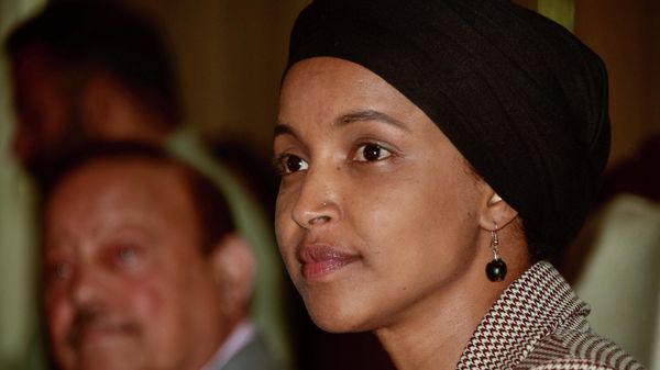 US congresswoman Ilhan Omar (R) looks on next to President of Pakistan-administered Kashmir Sultan Mehmood Chaudhry (L) during a press conference in Muzaffarabad on April 21, 2022. - Sputnik International