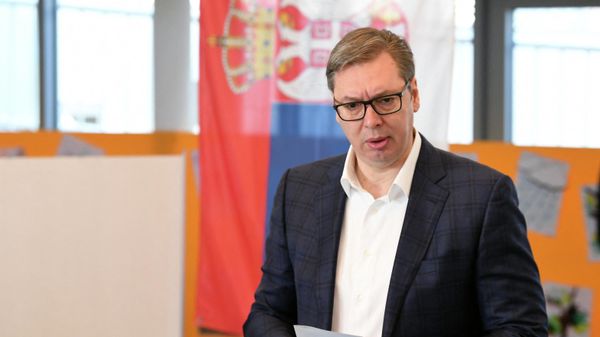 President of Serbia, Aleksandar Vucic prepares to cast his vote, at voting station in Serbian capital, Belgrade, on general elections day, April 3, 2022 - Sputnik International