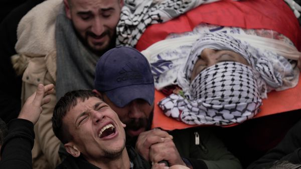Palestinian mourners carry the body of Ahmad Saif, 23, who died as a result of injuries sustained on March 1, during clashes with Israeli soldiers following a demonstration, during his funeral in the West Bank village of Burqa, March 9, 2022.  - Sputnik International
