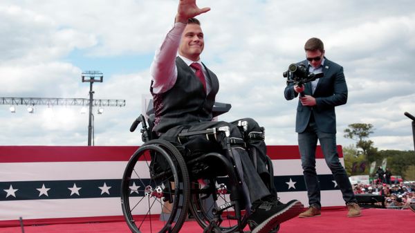 U.S. Rep. Madison Cawthorn, R-N.C., waves to the crowd after he spoke before former President Donald Trump takes the stage at a rally Saturday, April 9, 2022, in Selma, N.C. - Sputnik International