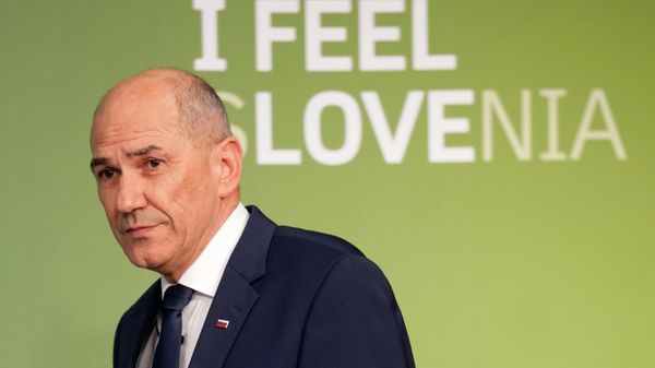 Outgoing Slovenian Prime Minister Janez Jansa walks on a stage to address the media in Ljubljana, Slovenia, Sunday, April 24, 2022. - Sputnik International