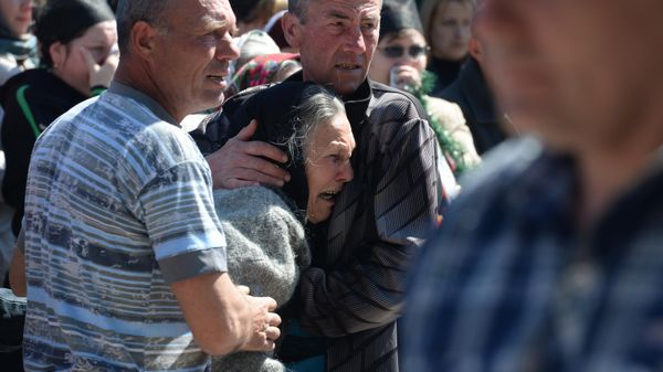 Панихида по погибшему ополченцу А.Лубенцу в Донецкой области, 2014 год - Sputnik International