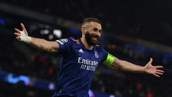 Real Madrid's French striker Karim Benzema celebrates after scoring a penalty kick and his team third goal during the UEFA Champions League semi-final first leg football match between Manchester City and Real Madrid, at the Etihad Stadium, in Manchester, on April 26, 2022 Real Madrid's French striker Karim Benzema celebrates after scoring a penalty kick and his team third goal during the UEFA Champions League semi-final first leg football match between Manchester City and Real Madrid, at the Etihad Stadium, in Manchester, on April 26, 2022 - Sputnik International