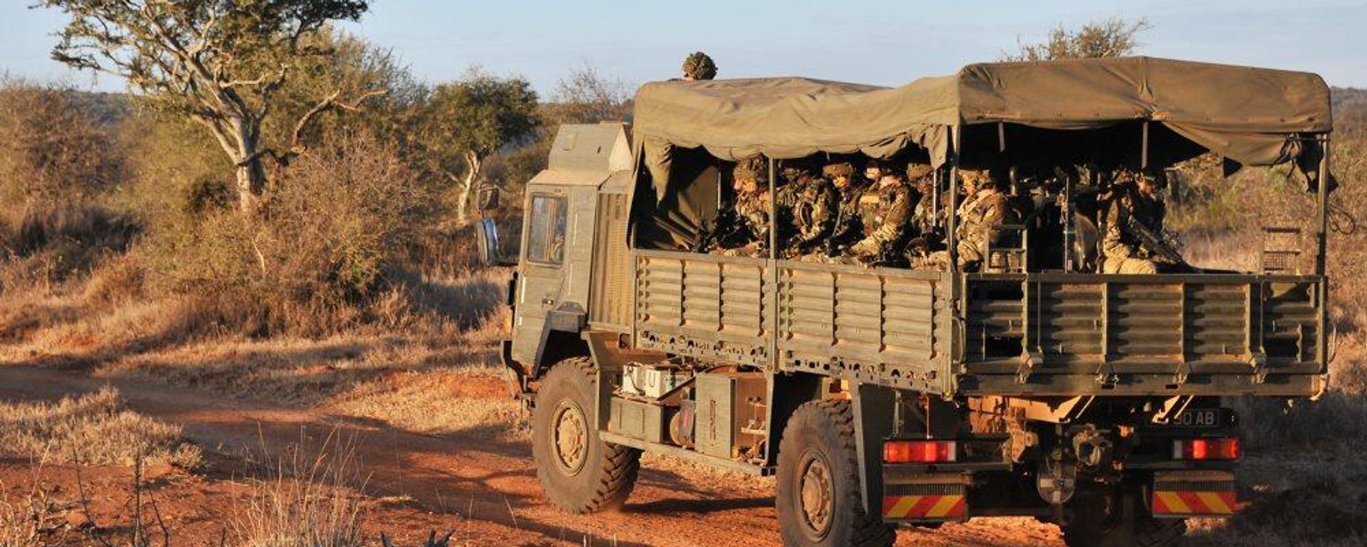 Soldiers 1st Battalion The Princess of Wales's Royal Regiment are transported on a Troop Carrying Vehicle (TCV) during Exercise Askari Thunder - Sputnik International, 1920, 29.04.2022
