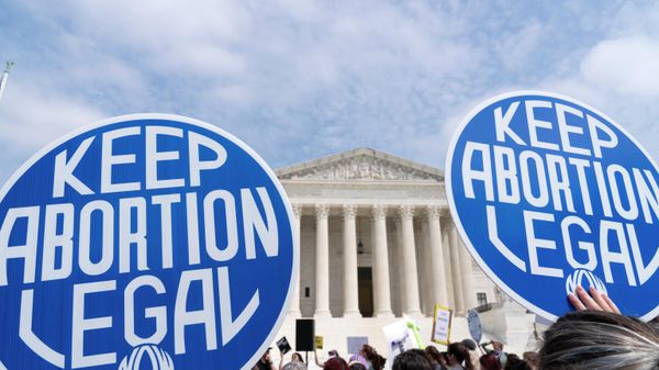 Demonstrators protest outside of the Supreme Court Tuesday, May 3, 2022 in Washington. A draft opinion suggests the U.S. Supreme Court could be poised to overturn the landmark 1973 Roe v. Wade case that legalized abortion nationwide, according to a Politico report released Monday. Whatever the outcome, the Politico report represents an extremely rare breach of the court's secretive deliberation process, and on a case of surpassing importance. - Sputnik International