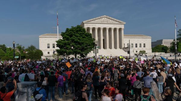 Demonstrators protest outside of the U.S. Supreme Court Tuesday, May 3, 2022 in Washington. A draft opinion suggests the U.S. Supreme Court could be poised to overturn the landmark 1973 Roe v. Wade case that legalized abortion nationwide, according to a Politico report released Monday. Whatever the outcome, the Politico report represents an extremely rare breach of the court's secretive deliberation process, and on a case of surpassing importance.  - Sputnik International
