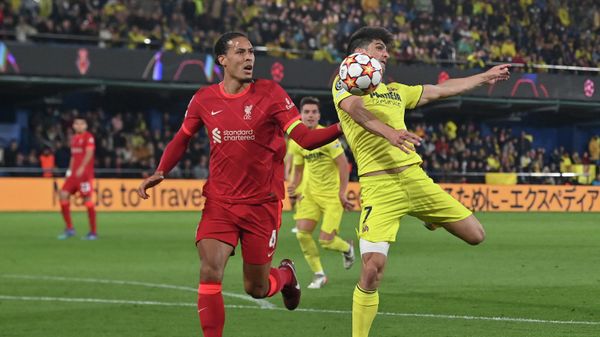 Liverpool's Dutch defender Virgil van Dijk (L) vies with Villarreal's Spanish forward Gerard Moreno during the UEFA Champions League semi final second leg football match between Liverpool and Villarreal CF at La Ceramica stadium in Vila-real on May 3, 2022 Liverpool's Dutch defender Virgil van Dijk (L) vies with Villarreal's Spanish forward Gerard Moreno during the UEFA Champions League semi final second leg football match between Liverpool and Villarreal CF at La Ceramica stadium in Vila-real on May 3, 2022 - Sputnik International