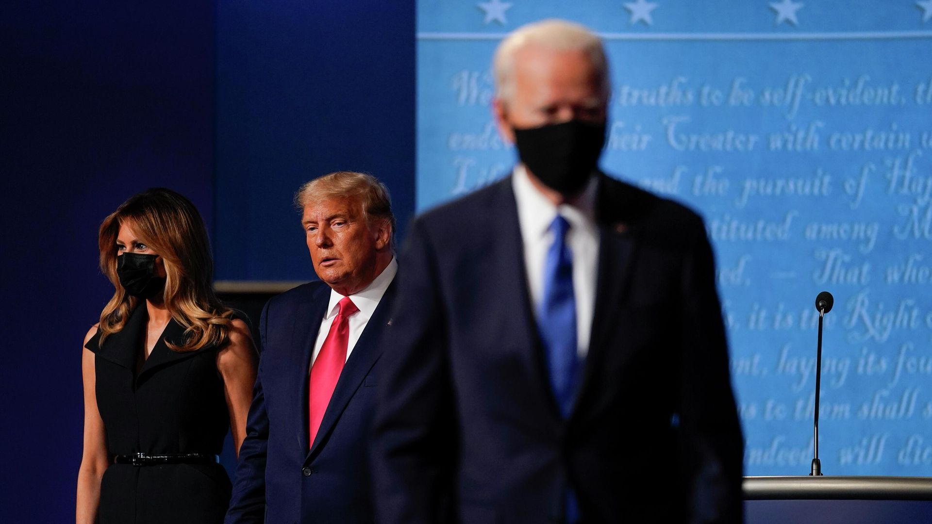 In this Oct. 22, 2020, file photo first lady Melania Trump, left, and President Donald Trump, center, remain on stage as Democratic presidential candidate former Vice President Joe Biden, right, walk away at the conclusion of the second and final presidential debate at Belmont University in Nashville, Tenn. - Sputnik International, 1920, 18.02.2023
