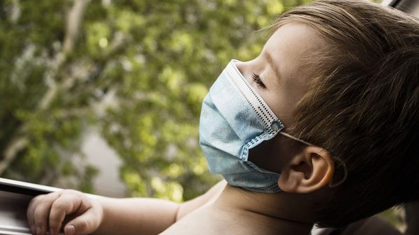 Little boy wearing a mask - Sputnik International