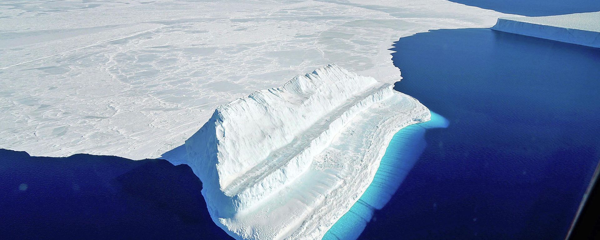 The frigid Antarctic region is an expanse of white ice and blue waters, as pictured in March, 2017, at the U.S. research facility McMurdo Station. The frigid Antarctic region is an expanse of white ice and blue waters, as pictured in March, 2017, at the U.S. research facility McMurdo Station. - Sputnik International, 1920, 28.01.2024