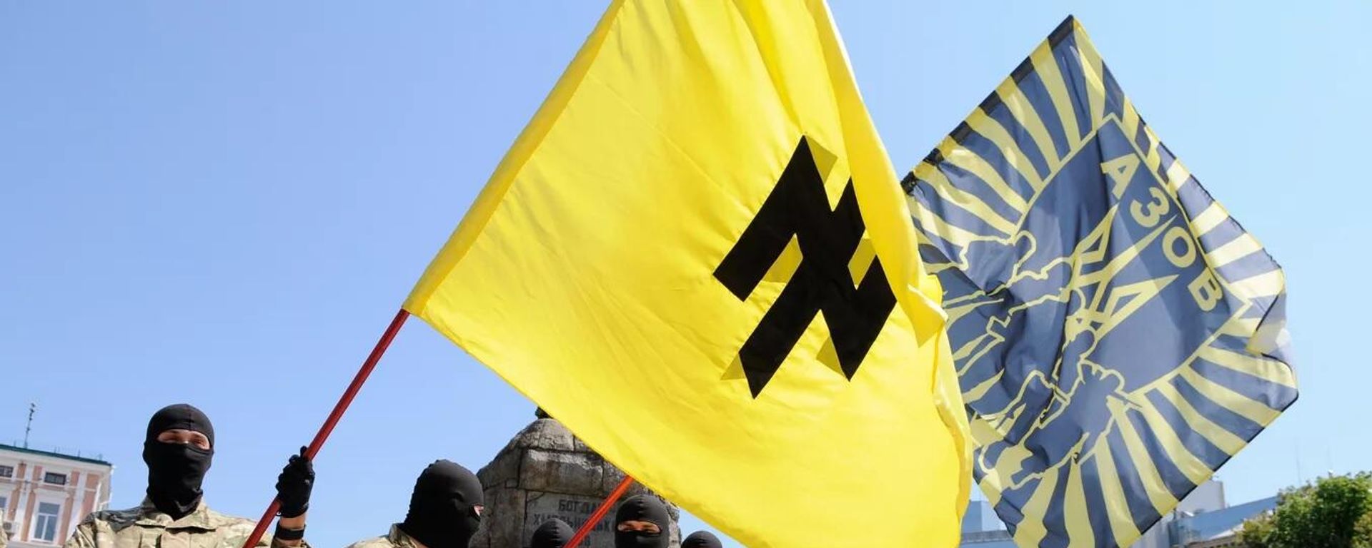 Fighters of the neo-Nazi Azov Battalion take the oath of allegiance to Ukraine in Sophia Square in Kiev before being sent to Donbass. Members of the Nazi battalion have committed hundreds of war crimes against the population of Donbass over eight years. The Azov flag has an inverted image of the runic symbol “Wolfsangel”, which was used by the Nazis. Fighters of the neo-Nazi Azov Battalion take the oath of allegiance to Ukraine in Sophia Square in Kiev before being sent to Donbass. Members of the Nazi battalion have committed hundreds of war crimes against the population of Donbass over eight years. The Azov flag has an inverted image of the runic symbol “Wolfsangel”, which was used by the Nazis. - Sputnik International, 1920, 15.11.2022