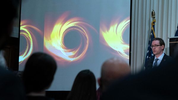 Astrophysicist at Center for Astrophysics Michael Johnson speaks during a news conference to announce the first image of Sagittarius A*, a supermassive black hole, at the center of the Milky Way Galaxy, in Washington, DC, on May 12, 2022.  - Sputnik International