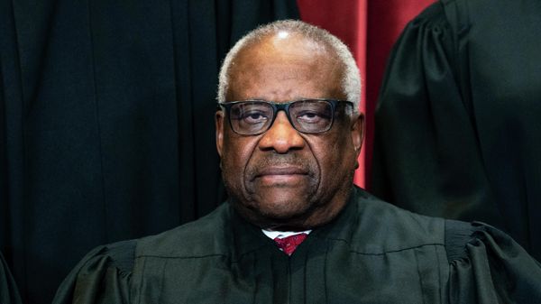 Justice Clarence Thomas sits during a group photo at the Supreme Court in Washington, on Friday, April 23, 2021. - Sputnik International